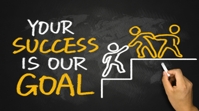 your success is our goal hand drawing on blackboard